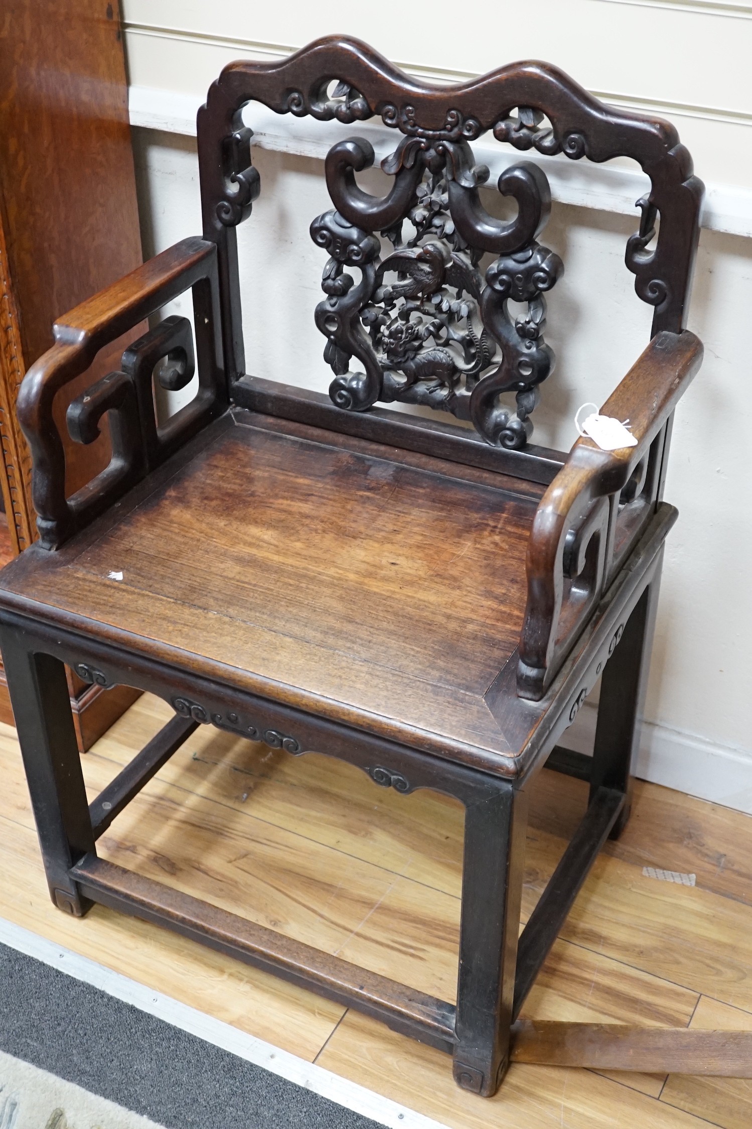 A 19th century Chinese hongmu armchair, width 64cm *Please note the sale commences at 9am.